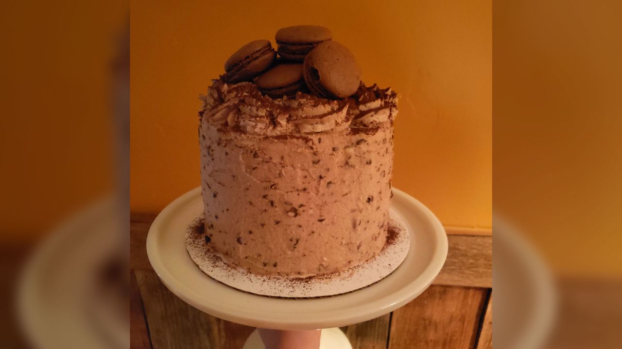 Utah resident McKenna Jo Haws baked this dark-chocolate cake with Irish whiskey. "The layers are filled with dulce de leche, and it's frosted with hazelnut Swiss meringue buttercream that I folded chocolate chips into," she said. "I topped it with homemade chocolate/dulce de leche macarons." She made it because her husband is considered an "essential" worker and he wanted to cheer up his co-workers.