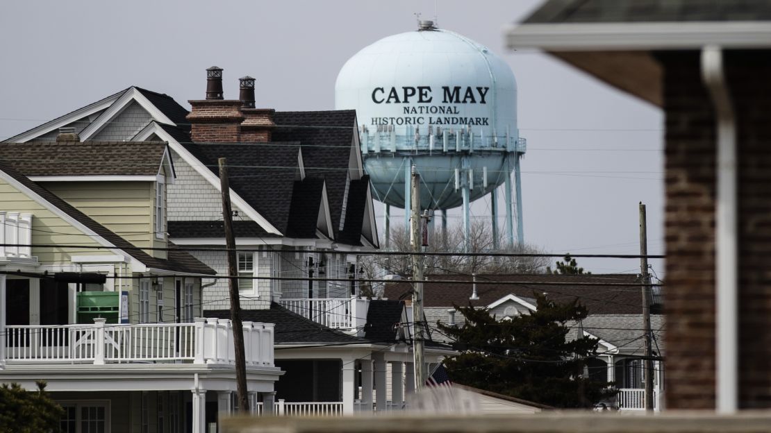 A water tower stands beyond residences in Cape May, New Jersey.