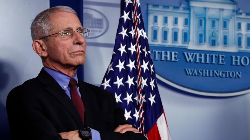 Dr. Anthony Fauci, director of the National Institute of Allergy and Infectious Diseases, listens during a briefing about the coronavirus in the James Brady Press Briefing Room, Friday, March 27, 2020, in Washington.