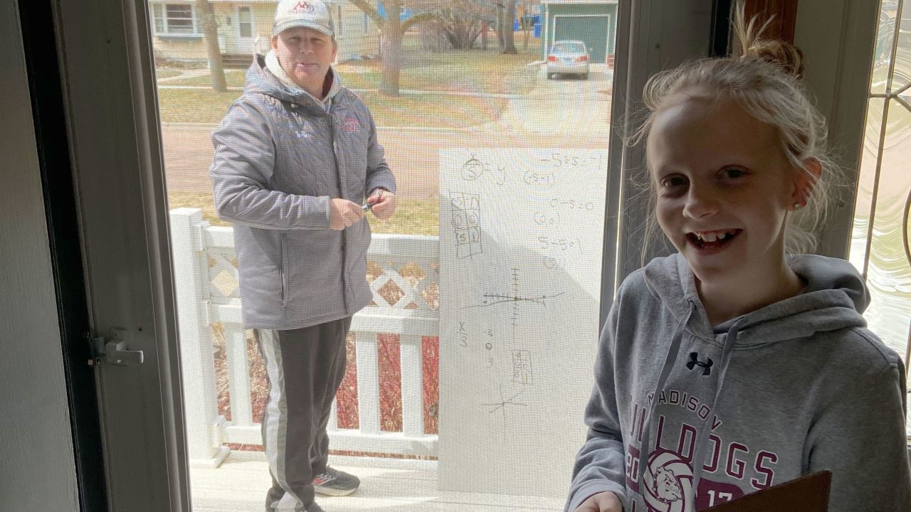 Chris Waba came over to Rylee Anderson's house to give her a face-to-face lesson while social distancing.
