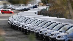 This picture shows cars parked at the Vauxhall factory in Ellesmere Port, east of Liverpool, after the owner, French automotive group PSA (Peugeot, Citroen, Opel brands ...) announced on March 16, 2020, the shutdown of all its factories in Europe during the week, due to the coronavirus. (Photo by Paul Ellis/AFP/Getty Images)