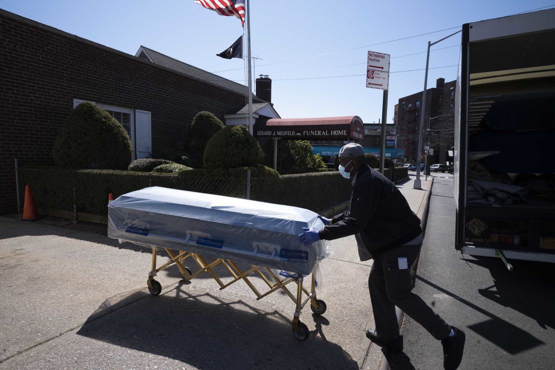 William Samuels delivers caskets to the Gerard Neufeld Funeral Home in the Queens borough of New York City on Friday, March 27, 2020.