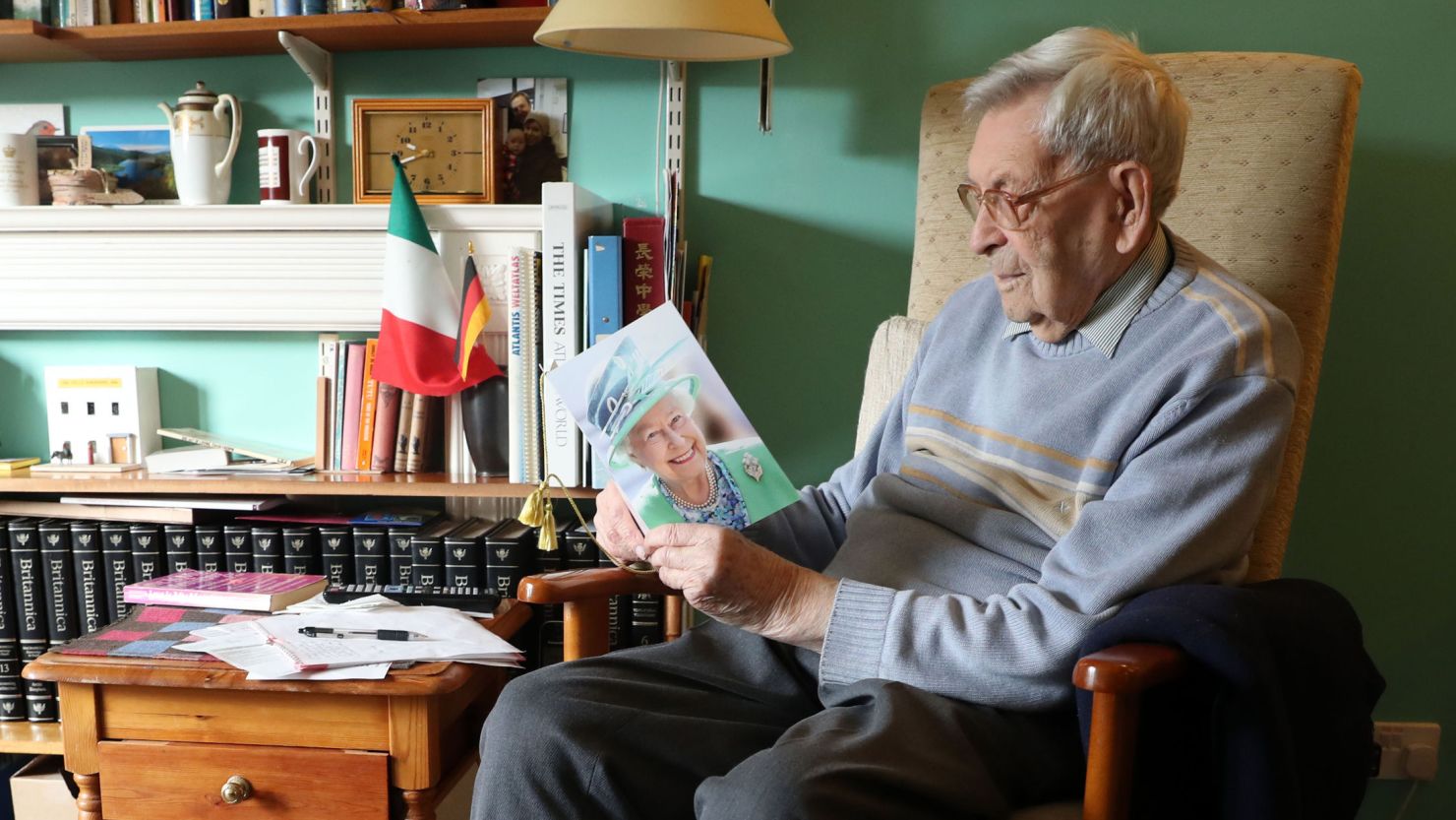 The oldest living man is British pensioner Robert Weighton, who is 112 years old, seen holding a telegram from the Queen in February 2018.