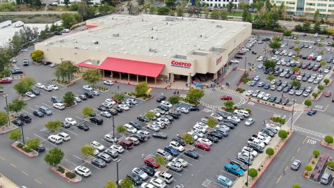 You'll need to trek to a physical Costco store to exchange your rewards certificate for cash.