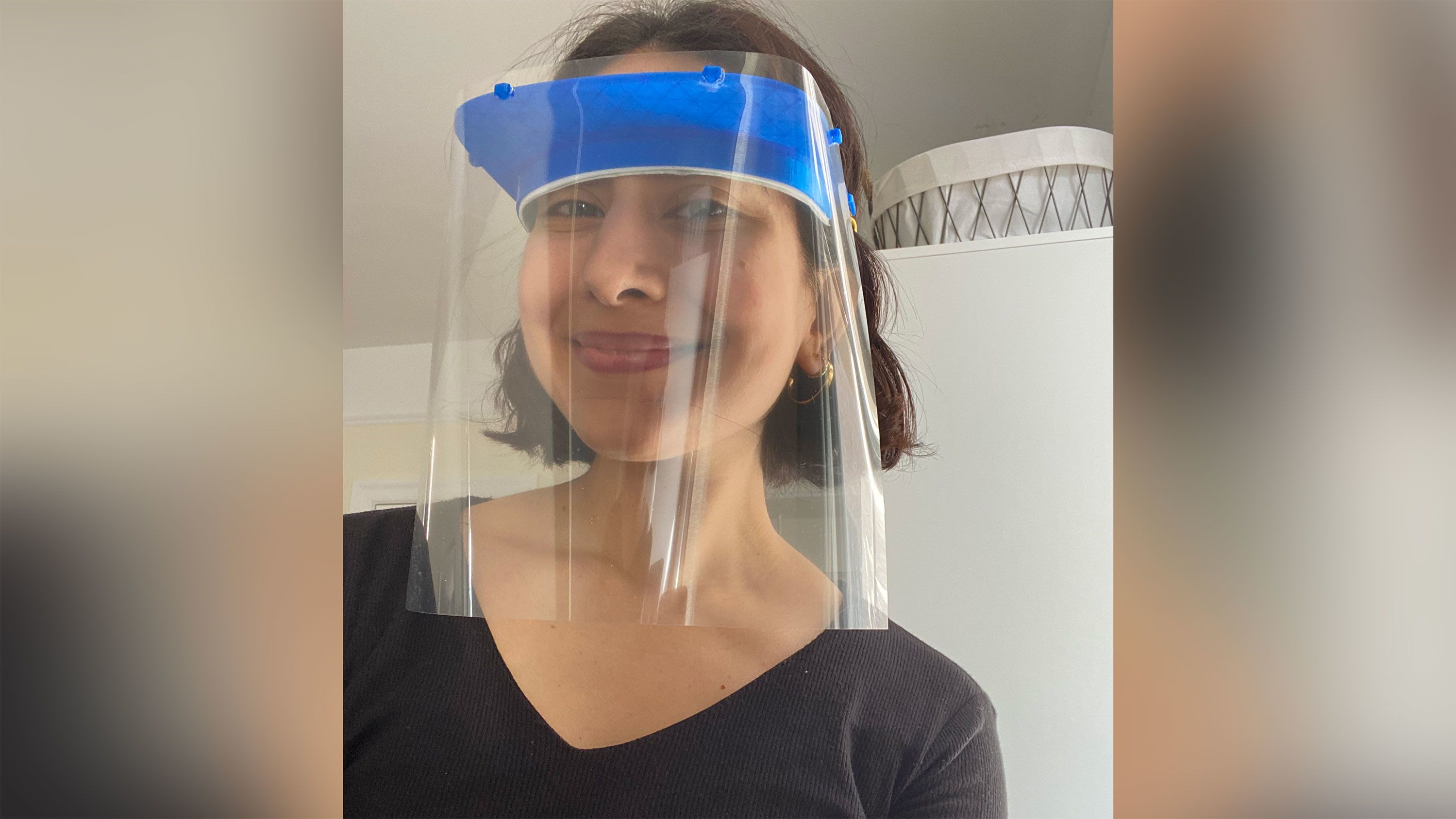 Madiha Choksi wears one of the face shields 3D printed for health care workers in New York.