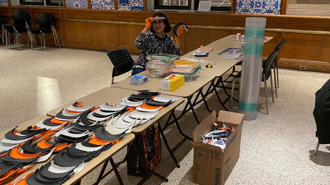 Choksi at the assembly line volunteers created to make the face shields.