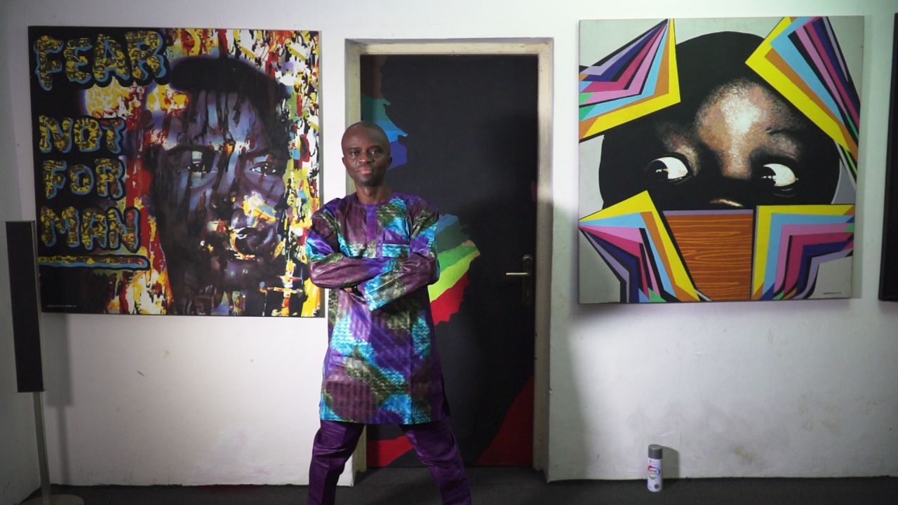 Artist Lemi Ghariokwu, known for the cover images he created for the recordings of Nigerian musician Fela Kuti, in his studio.