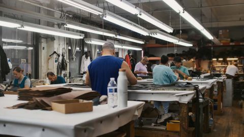 The employees of Pietro Handbags at work in their factory in New York City.