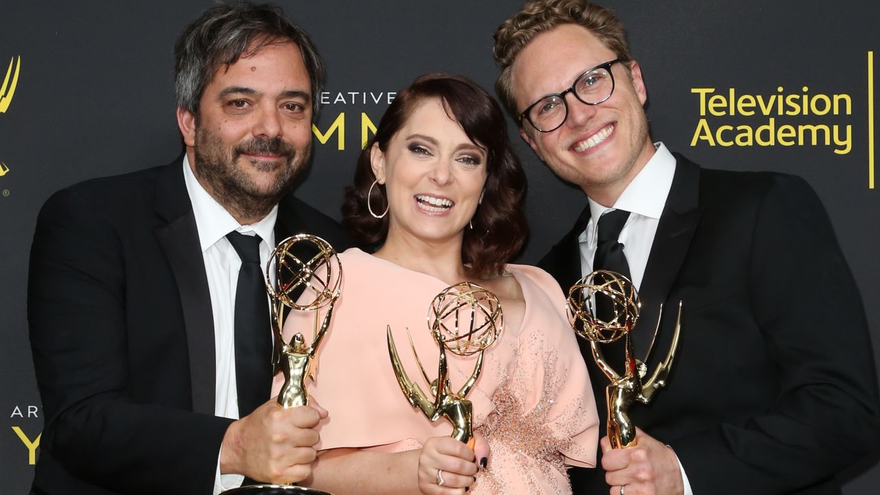 Adam Schlesinger, Rachel Bloom and Jack Dolgen pose for photos in the press room for the 2019 Creative Arts Emmy Awards in September. (Photo by Paul Archuleta/FilmMagic)