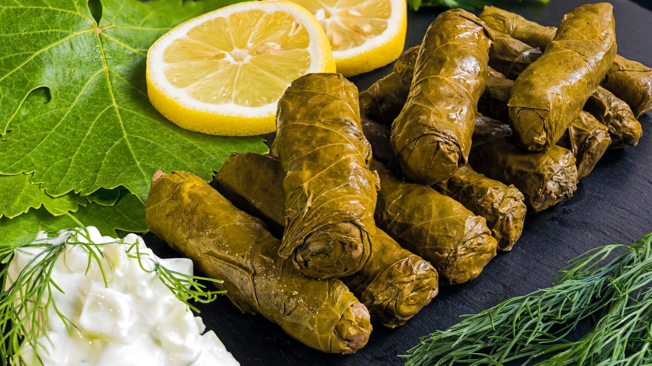This traditional dish is essentially  vine leaves rolled and filled with either well-seasoned rice or mincemeat.