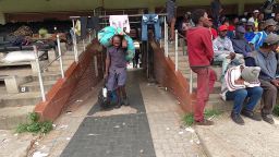 South Africa's homeless are being rounded up into an open stadium with no real sanitation, no social distancing and limited food. CNN's David McKenzie reports.