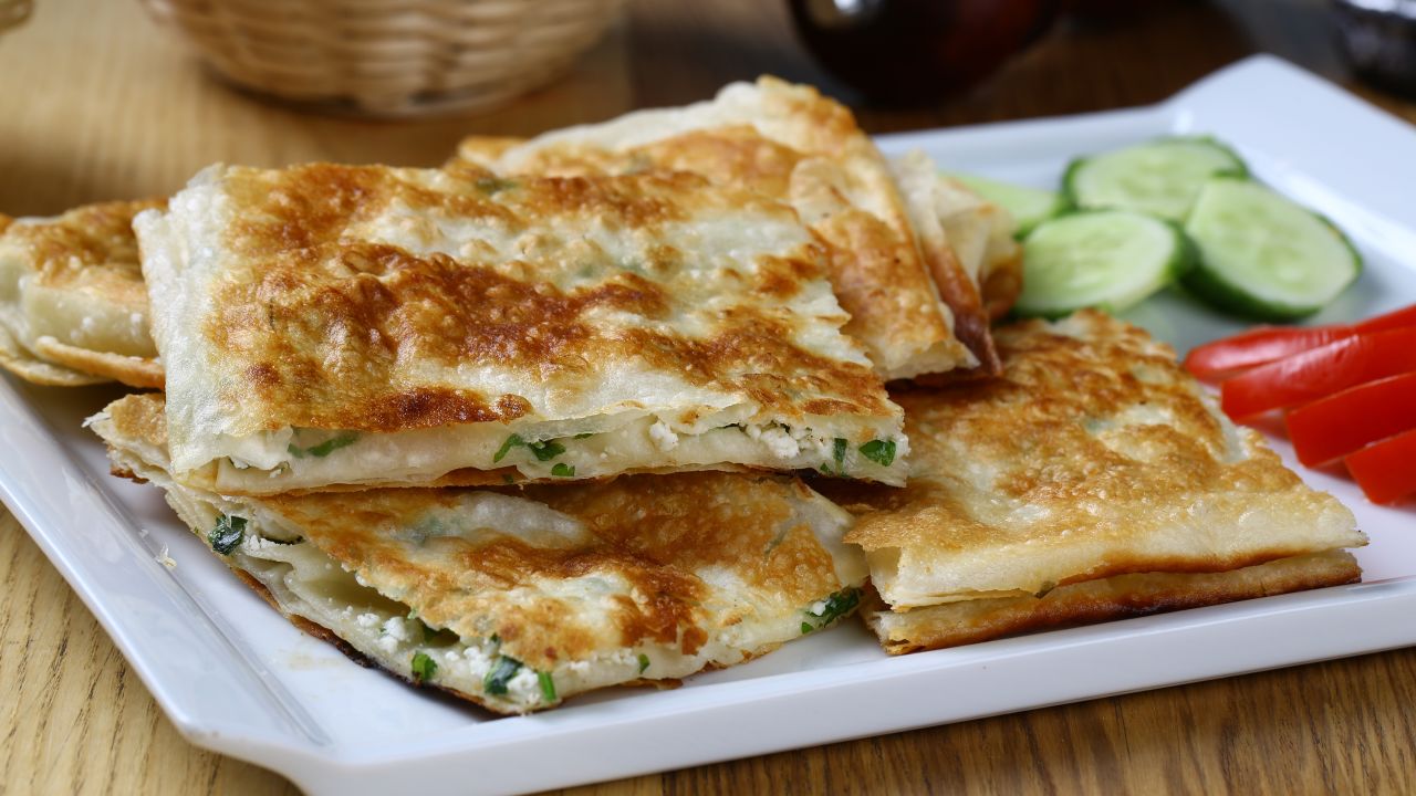 This traditional Turkish pastry is often stuffed with salty white cheese, minced beef or spinach.
