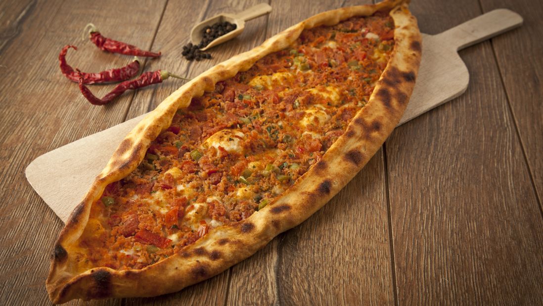 <strong>Pide: </strong>A favorite among Turks, pide is a type of flatbread made from dough balls stretched out into an extended base and inserted with a range of fillings. 