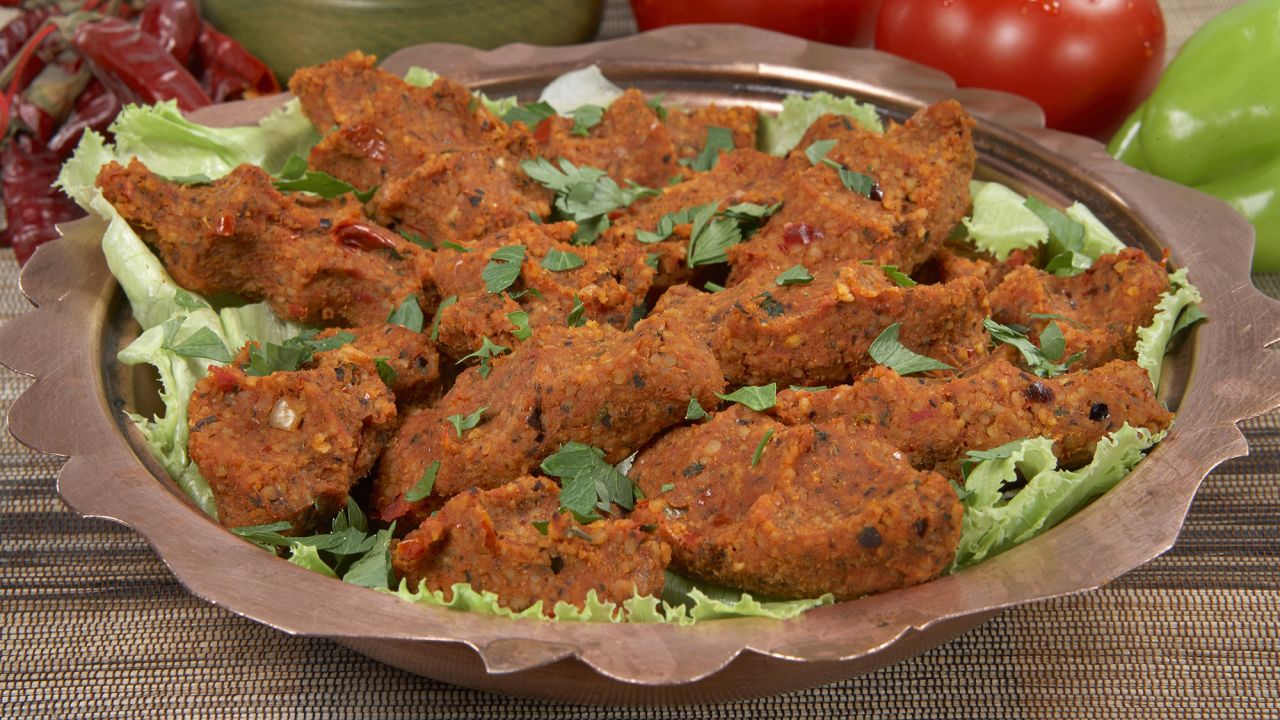 Cig kofte -- a raw meatball dish in which the meat is usually substituted with bulgur and/or ground walnuts.
