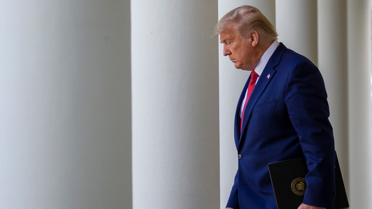 WASHINGTON, DC - MARCH 29:  U.S. President Donald Trump walks to the Rose Garden for the daily coronavirus briefing at the White House on March 29, 2020 in Washington, DC. The United States is advising?residents of New York, New Jersey and Connecticut?not to travel domestically after the number of reported?coronavirus?(COVID-19) deaths doubled to over 2,000 nationwide?within two days. (Photo by Tasos Katopodis/Getty Images)