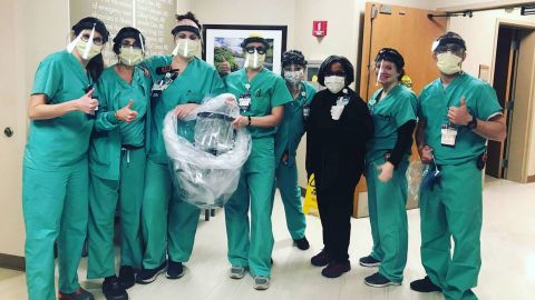 Health care workers at Alaska Regional Hospital in Anchorage wearing face shields designed by Katz and Collins.