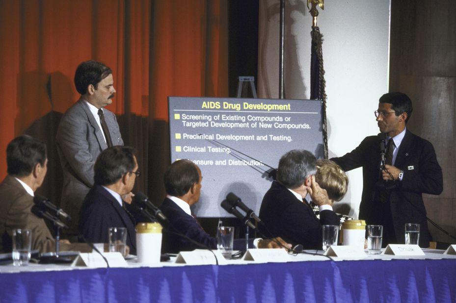 Fauci, right, briefs President Ronald Reagan, far left, and other members of the President's Commission on AIDS in 1987.