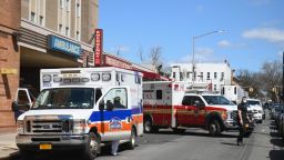 Ambulances in front of the emergency room entrance of the Wyckoff Heights Medical Center in Brooklyn on April 02, 2020 in New York. - The Federal Emergency Management Agency (FEMA) has asked the US Defense Department for 100,000 body bags as the toll mounts from the novel coronavirus, the Pentagon said on April 2. White House experts have said that US deaths from the disease -- currently at more than 5,100 -- are expected to climb to between 100,000 and 240,000, even with mitigation efforts in force. (Photo by Angela Weiss / AFP) (Photo by ANGELA WEISS/AFP via Getty Images)
