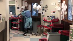 Medical staff in the hallway of the Covid-19 intensive care unit at Harborview Medical Center in Seattle.