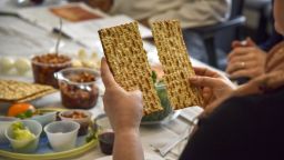 ROCKVILLE, MD - APRIL 24:
Rabbi Janet Ozur Bass breaks a piece of unleavened bread at an Interfaith Passover seder hosted by Montgomery County council member Sidney Katz at the Montgomery County Council Office Building on Wednesday, April 24, 2019, in Rockville, MD.  About 20 religious leaders of different faiths gather in an effort to combat a spate of hate crimes in Montgomery County.  Three-fourths of the the 37 reported bias crimes motivated by religion last year were anti-Semitic, according to Montgomery police.
(Photo by Jahi Chikwendiu/The Washington Post via Getty Images)