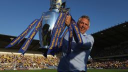 OXFORD, ENGLAND - JULY 19: Gary Lineker poses for a picture with the Premier League Trophy prior to the pre-season friendly between Oxford City and Leicester City at Kassam Stadium on July 19, 2016 in Oxford, England. (Photo by Steve Bardens/Getty Images)