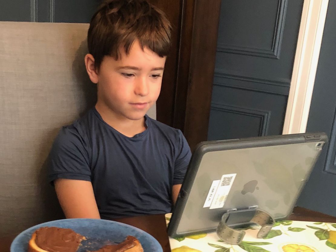 Second grader Jack Simon takes a class through Zoom, powered by Nutella on toast.