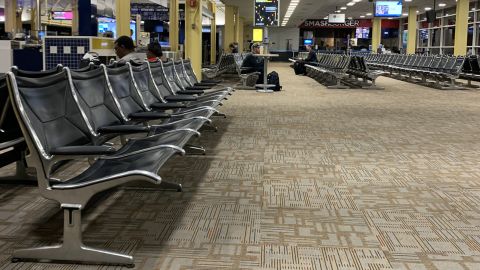 Empty seats and few people met Sheryl Pardo at the airport.