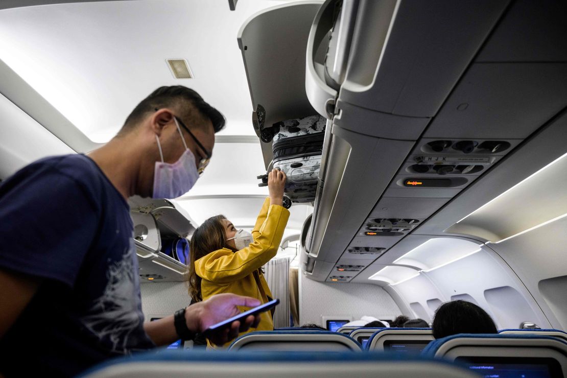 Harvard researchers described wearing masks as a critical part of keeping travelers safe in aircraft cabins, but stopped short of calling for a government mask mandate onboard flights. 