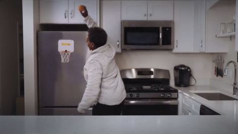 Chicago Mayor Lori Lightfoot takes it to the hoop in her kitchen.