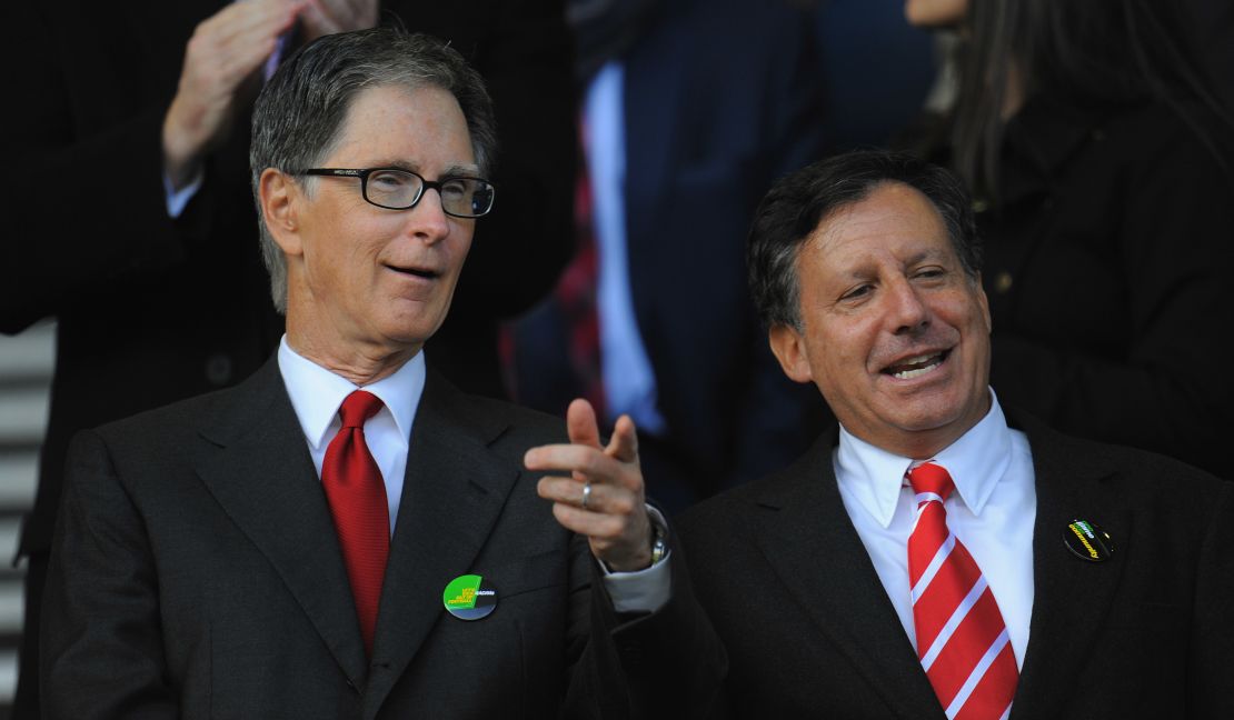 Liverpool co-owners John W Henry (left) and chairman Tom Werner have seen the club's fortunes improve since taking over the club in 2010.
