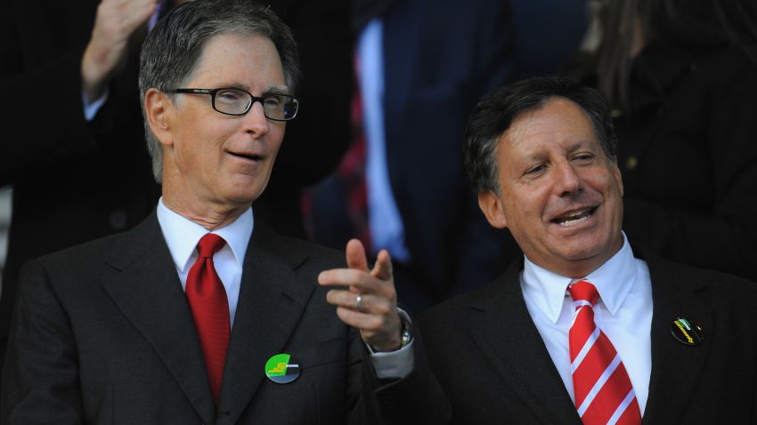 Liverpool co-owners John W Henry (left) and chairman Tom Werner have seen the club's fortunes improve since taking over the club in 2010.
