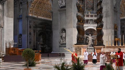 Pope Francis celebrates Palm Sunday mass behind closed doors at the Chair of Saint Peter in St. Peter's Basilica.