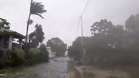 The storm blows through Luganville, Vanuatu on Monday.
