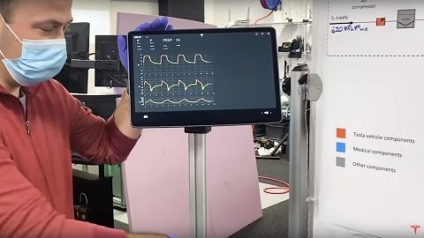 A Tesla engineer shows off a prototype ventilator that's made with a Tesla Model 3 display screen.