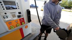 LOUISVILLE, KENTUCKY - APRIL 02: A person pumps gas at a gas station as the national average falls under $2 per gallon amid the coronavirus pandemic on April 02, 2020 in Louisville, Kentucky. According to AAA, roughly 70% of U.S. gas stations are offering $1.99 or less per gallon, which is the lowest price in four years. (Photo by Andy Lyons/Getty Images)