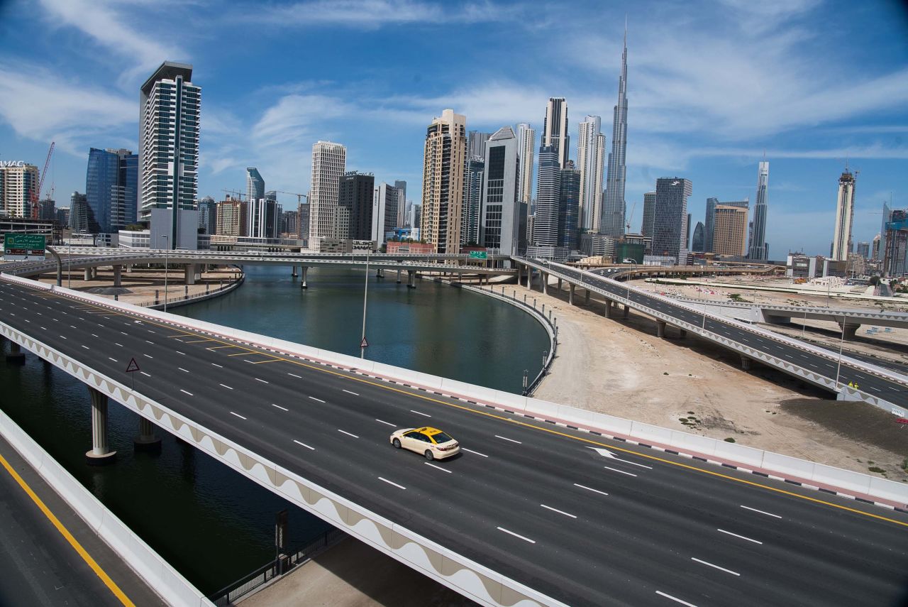 A lone taxi drives over a typically gridlocked highway in Dubai, United Arab Emirates, on April 6.