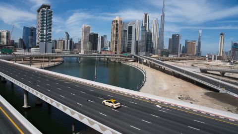 A lone taxi drives over a typically gridlocked highway in Dubai, United Arab Emirates, on April 6.