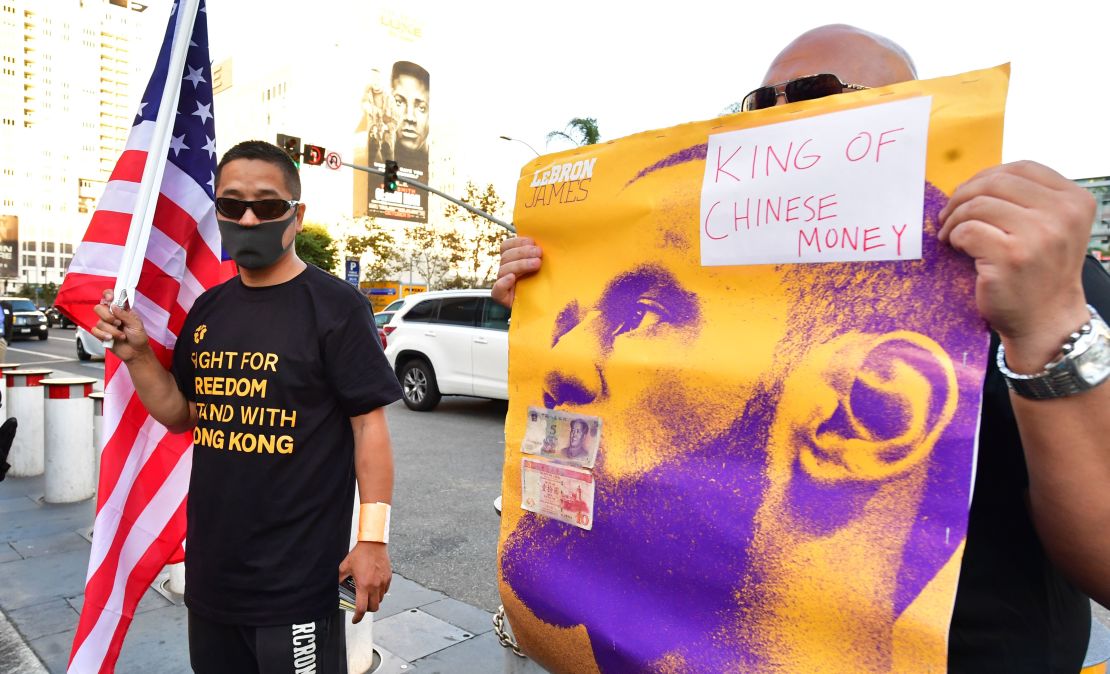 Anti-Chinese Communist Party activists protest outside Staples Center where free t-shirts were distributed supporting Hong Kong.