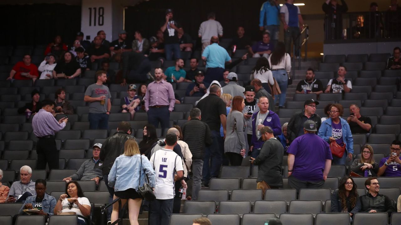 Fans leave the building after the Sacramento King game against the New Orleans Pelicans was postponed due to the coronavirus outbreak.