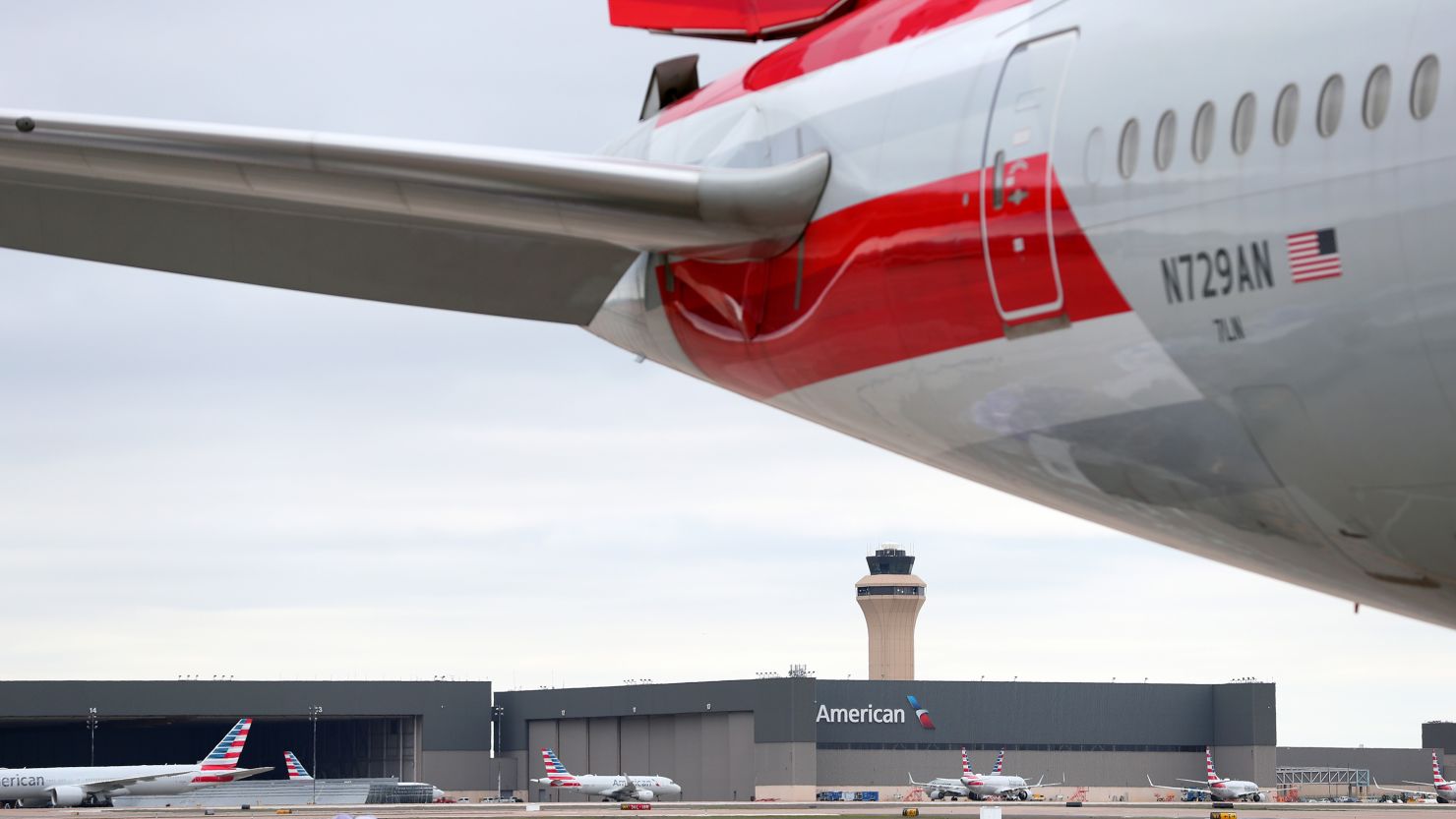 DALLAS, TEXAS - MARCH 20: A detail view as American Airlines fleet services employees prepare to load cargo pallets on a 777-300 at Dallas/Fort Worth International Airport (DFW) bound for Frankfurt Airport in Germany during the cornoavirus (COVID-19) pandemic on March 20, 2020 in Dallas, Texas. The first cargo-only flight departs from Dallas Fort Worth International Airport (DFW) tomorrow, March 20, landing at Frankfurt Airport (FRA) March 21. The Boeing 777-300 will operate two round trips between DFW and FRA over the course of four days, carrying only cargo and necessary flight personnel. This is the first scheduled cargo-only fight since 1984 when American retired the last of its Boeing 747 freighters. (Photo by Tom Pennington/Getty Images)