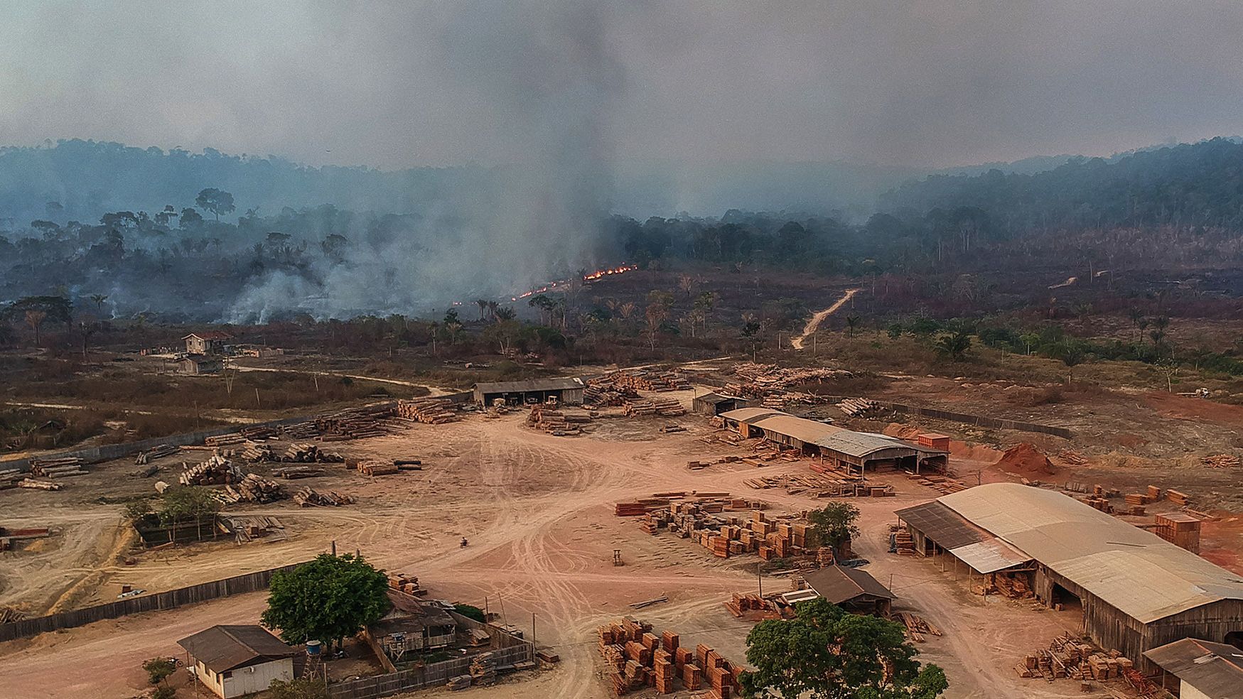Aerial view in 2019 of a sawmill in Moraes Almeida, -a town along a section of the trans-Amazonian highyway-, in Itaituba, Para state, Brazil. 