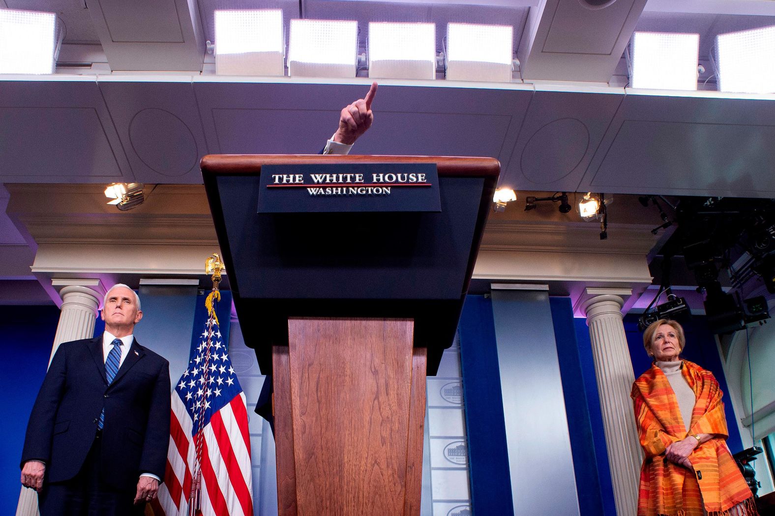 Trump — flanked by Vice President Mike Pence and Dr. Deborah Birx, the White House coronavirus response coordinator — gestures over the lectern as he speaks on April 3. <a href="index.php?page=&url=https%3A%2F%2Ftwitter.com%2Fweijia%2Fstatus%2F1246213280839933952" target="_blank" target="_blank">Weijia Jiang of CBS News asked Trump</a> to clarify what his son-in-law Jared Kushner meant by the word "our" at the previous day's briefing when he said: "the notion of the federal stockpile was it's supposed to be our stockpile — it's not supposed to be state stockpiles that they then use." Trump responded: "You know what 'our' means? The United States of America — that's what it means. ... And then we take that 'our' and we distribute it to the states." He also added: "It's such a basic, simple question and you try and make it sound so bad. You ought to be ashamed of yourself."