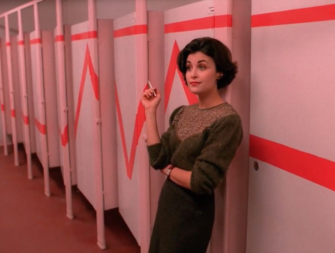 Audrey Horne (Sherilynn Fenn) smoking in the school bathroom