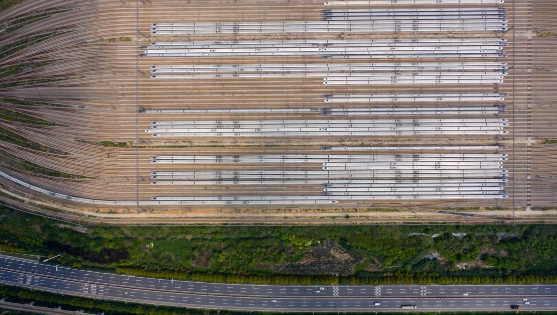 An aerial photo, taken on April 7, shows bullet trains lined up at a station in Wuhan in China's central Hubei province.  