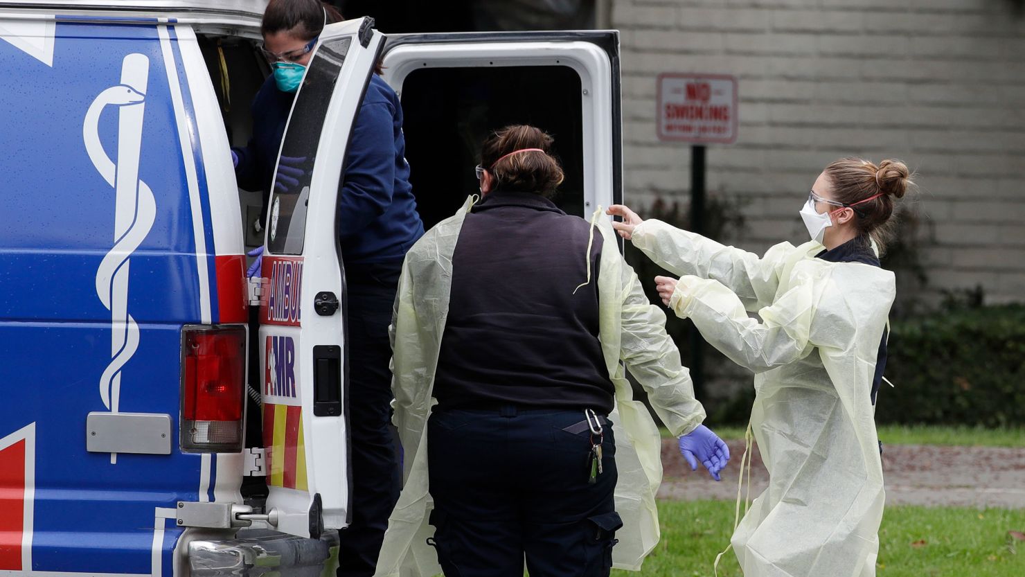 Ambulance personnel get ready to evacuate patients from the Magnolia Rehabilitation and Nursing Center in Riverside, California.