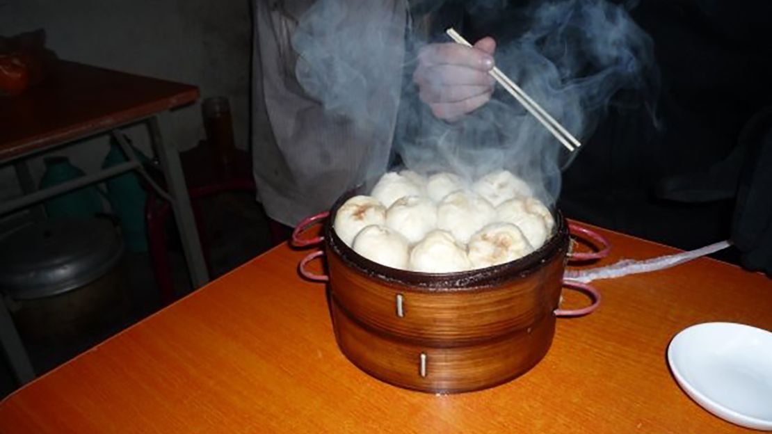 Steamed pork dumplings eaten in a nondescript Chinese restaurant.