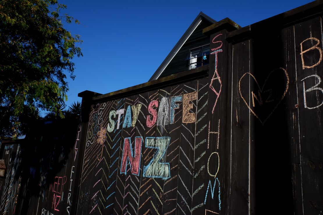 A house fence chalked up with messages relating to the Covid-19 lockdown on April 3, 2020 in Auckland, New Zealand.