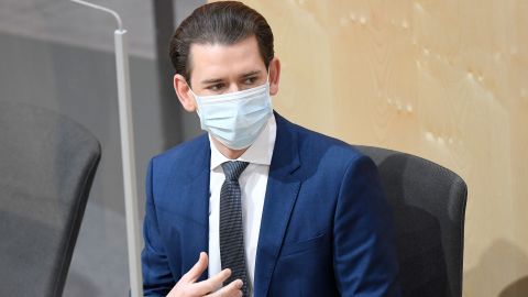 Austria's Chancellor Sebastian Kurz wears a protective mask as he arrives for a special session of the National Council on April 3 in Vienna.