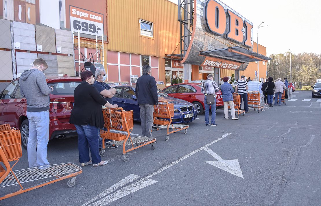 People wait in line to enter a reopened shop in the city of Havirov, in the Czech Republic, last Thursday.