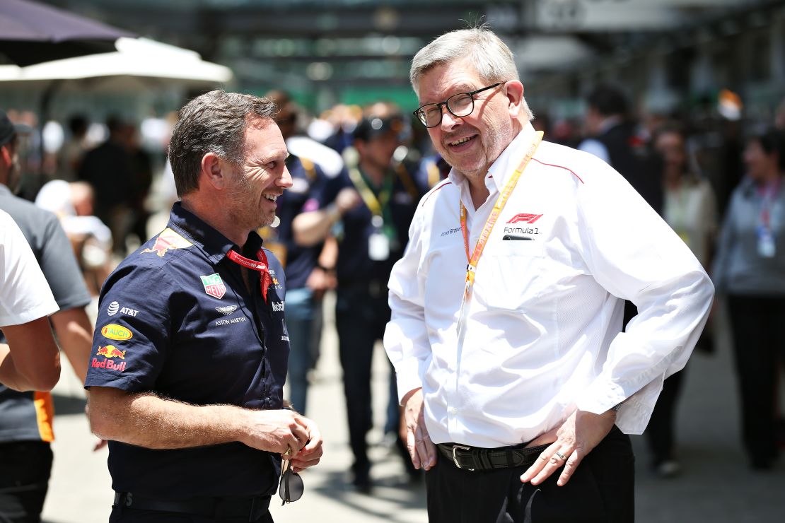 Brawn chats with Red Bull Racing Team Principal Christian Horner.